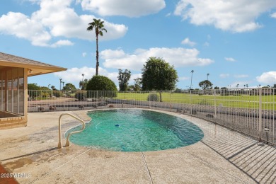 This spacious Columbine model sits on a large lot with on Sun City Lakes West and East in Arizona - for sale on GolfHomes.com, golf home, golf lot