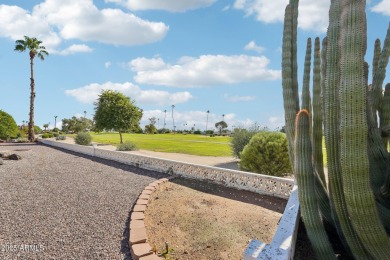 This spacious Columbine model sits on a large lot with on Sun City Lakes West and East in Arizona - for sale on GolfHomes.com, golf home, golf lot