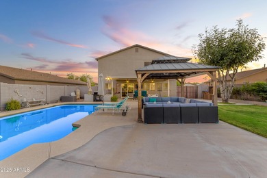 Welcome to this beautifully updated 4-bedroom, 2.5-bath home on The Golf Club At Johnson Ranch in Arizona - for sale on GolfHomes.com, golf home, golf lot