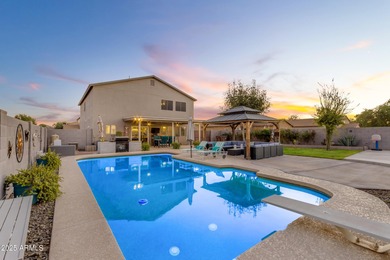 Welcome to this beautifully updated 4-bedroom, 2.5-bath home on The Golf Club At Johnson Ranch in Arizona - for sale on GolfHomes.com, golf home, golf lot