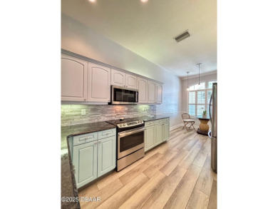 Stunning updated 3BR, 2BA villa in the highly sought-after on Halifax Plantation Golf Club in Florida - for sale on GolfHomes.com, golf home, golf lot
