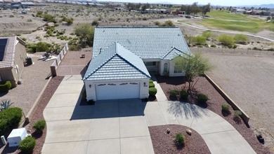 This home is located in the prestigious gated community of Los on Los Lagos Golf Club in Arizona - for sale on GolfHomes.com, golf home, golf lot