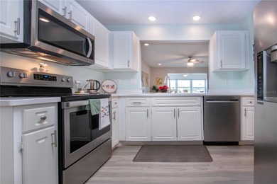 A truly rare find.  Beautiful move-in-ready WATERFRONT HOME in on Caloosa Greens Executive Golf Course in Florida - for sale on GolfHomes.com, golf home, golf lot