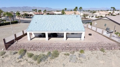 This home is located in the prestigious gated community of Los on Los Lagos Golf Club in Arizona - for sale on GolfHomes.com, golf home, golf lot