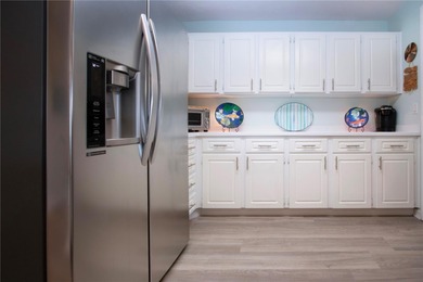 A truly rare find.  Beautiful move-in-ready WATERFRONT HOME in on Caloosa Greens Executive Golf Course in Florida - for sale on GolfHomes.com, golf home, golf lot