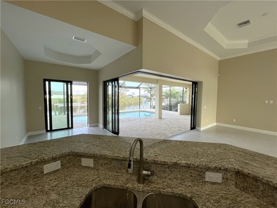 This is the LOWEST PRICED new construction Gulf access home in on Burnt Store Golf Club in Florida - for sale on GolfHomes.com, golf home, golf lot