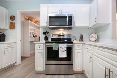 A truly rare find.  Beautiful move-in-ready WATERFRONT HOME in on Caloosa Greens Executive Golf Course in Florida - for sale on GolfHomes.com, golf home, golf lot