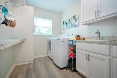 A truly rare find.  Beautiful move-in-ready WATERFRONT HOME in on Caloosa Greens Executive Golf Course in Florida - for sale on GolfHomes.com, golf home, golf lot