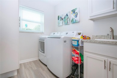 A truly rare find.  Beautiful move-in-ready WATERFRONT HOME in on Caloosa Greens Executive Golf Course in Florida - for sale on GolfHomes.com, golf home, golf lot