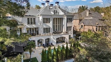 This extraordinary estate in the prestigious Windward community on The Golf Club of Georgia in Georgia - for sale on GolfHomes.com, golf home, golf lot