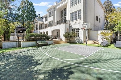 This extraordinary estate in the prestigious Windward community on The Golf Club of Georgia in Georgia - for sale on GolfHomes.com, golf home, golf lot