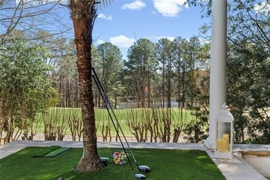 This extraordinary estate in the prestigious Windward community on The Golf Club of Georgia in Georgia - for sale on GolfHomes.com, golf home, golf lot