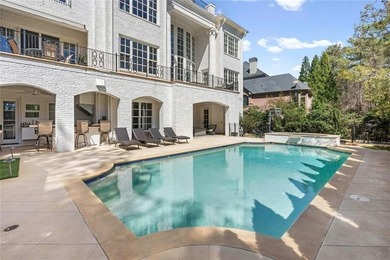 This extraordinary estate in the prestigious Windward community on The Golf Club of Georgia in Georgia - for sale on GolfHomes.com, golf home, golf lot