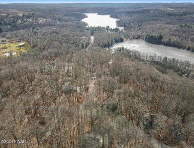 Escape to your personal sanctuary in the gated community of The on The Hideout Golf in Pennsylvania - for sale on GolfHomes.com, golf home, golf lot