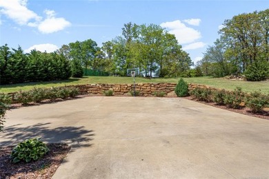 Nestled amidst sprawling landscapes and panoramic vistas in the on Oaks Country Club in Oklahoma - for sale on GolfHomes.com, golf home, golf lot