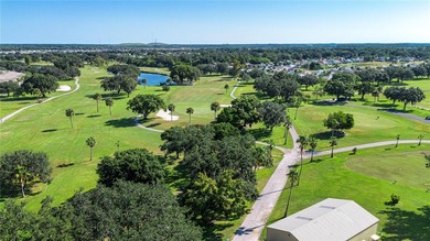 A truly rare find.  Beautiful move-in-ready WATERFRONT HOME in on Caloosa Greens Executive Golf Course in Florida - for sale on GolfHomes.com, golf home, golf lot
