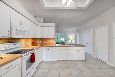 One or more photos have been virtually stagede take a look at on Kings Ridge Golf Club in Florida - for sale on GolfHomes.com, golf home, golf lot