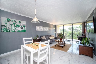 Welcome to this beautifully remodeled condo in the section of on Cove Cay Country Club in Florida - for sale on GolfHomes.com, golf home, golf lot