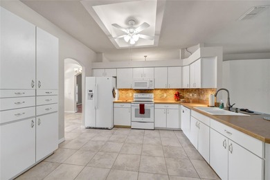 One or more photos have been virtually stagede take a look at on Kings Ridge Golf Club in Florida - for sale on GolfHomes.com, golf home, golf lot