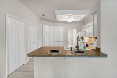 One or more photos have been virtually stagede take a look at on Kings Ridge Golf Club in Florida - for sale on GolfHomes.com, golf home, golf lot