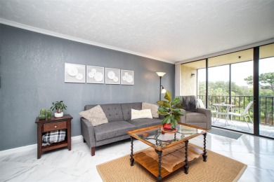 Welcome to this beautifully remodeled condo in the section of on Cove Cay Country Club in Florida - for sale on GolfHomes.com, golf home, golf lot