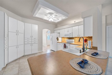 One or more photos have been virtually stagede take a look at on Kings Ridge Golf Club in Florida - for sale on GolfHomes.com, golf home, golf lot