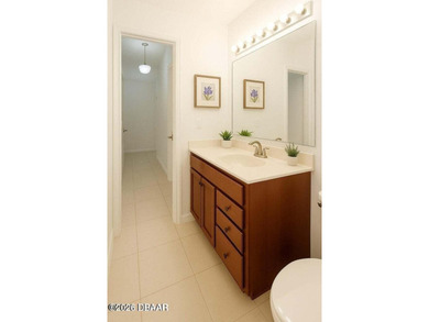 Gated Plantation Bay home with private preserve views and a on Plantation Bay Golf and Country Club in Florida - for sale on GolfHomes.com, golf home, golf lot