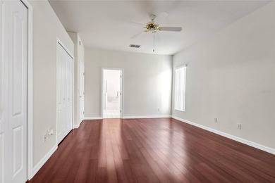 One or more photos have been virtually stagede take a look at on Kings Ridge Golf Club in Florida - for sale on GolfHomes.com, golf home, golf lot