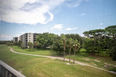 Welcome to this beautifully remodeled condo in the section of on Cove Cay Country Club in Florida - for sale on GolfHomes.com, golf home, golf lot