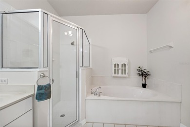 One or more photos have been virtually stagede take a look at on Kings Ridge Golf Club in Florida - for sale on GolfHomes.com, golf home, golf lot