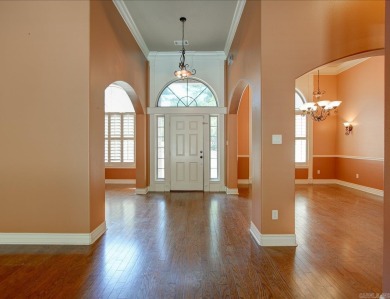 Custom Craftsman-style home with an open floor plan, cathedral on Granada Golf Course in Arkansas - for sale on GolfHomes.com, golf home, golf lot