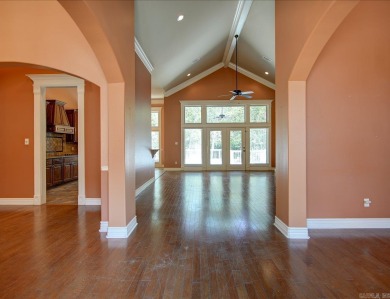 Custom Craftsman-style home with an open floor plan, cathedral on Granada Golf Course in Arkansas - for sale on GolfHomes.com, golf home, golf lot