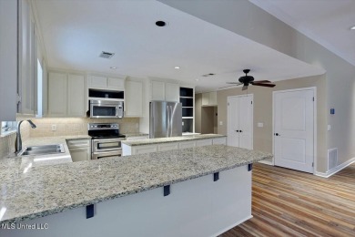 Calling all golfers!! Here is an updated 4 bedroom, 2.5 bathroom on Bay Pointe Golf and Resort in Mississippi - for sale on GolfHomes.com, golf home, golf lot