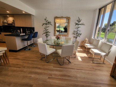 This exceptional corner unit offers stunning south and on Desert Island Golf and Country Club in California - for sale on GolfHomes.com, golf home, golf lot