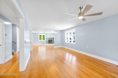 This spacious beach house offers extensive modern updates with on Oak Island Golf Club in North Carolina - for sale on GolfHomes.com, golf home, golf lot