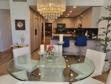 This exceptional corner unit offers stunning south and on Desert Island Golf and Country Club in California - for sale on GolfHomes.com, golf home, golf lot