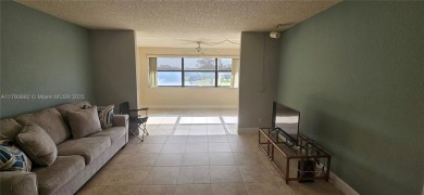 Bright and well-maintained 2BD/2BA unit in desirable Sunrise on Sunrise Lakes Phase IV Golf Course in Florida - for sale on GolfHomes.com, golf home, golf lot