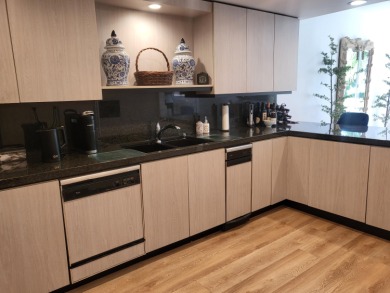 This exceptional corner unit offers stunning south and on Desert Island Golf and Country Club in California - for sale on GolfHomes.com, golf home, golf lot