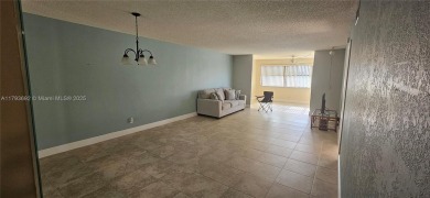 Bright and well-maintained 2BD/2BA unit in desirable Sunrise on Sunrise Lakes Phase IV Golf Course in Florida - for sale on GolfHomes.com, golf home, golf lot