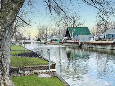 Tucked away on a peaceful dead-end street, this beautifully on Lake Erie Metropark Golf Course in Michigan - for sale on GolfHomes.com, golf home, golf lot