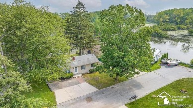 Tucked away on a peaceful dead-end street, this beautifully on Lake Erie Metropark Golf Course in Michigan - for sale on GolfHomes.com, golf home, golf lot