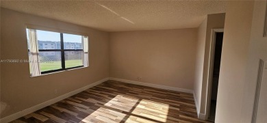 Bright and well-maintained 2BD/2BA unit in desirable Sunrise on Sunrise Lakes Phase IV Golf Course in Florida - for sale on GolfHomes.com, golf home, golf lot