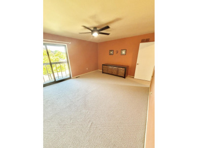 2 story, 2 bed, 1.5 bath townhouse condo with basement and on Plum Brook Golf Club in Michigan - for sale on GolfHomes.com, golf home, golf lot