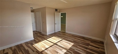 Bright and well-maintained 2BD/2BA unit in desirable Sunrise on Sunrise Lakes Phase IV Golf Course in Florida - for sale on GolfHomes.com, golf home, golf lot