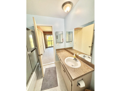 2 story, 2 bed, 1.5 bath townhouse condo with basement and on Plum Brook Golf Club in Michigan - for sale on GolfHomes.com, golf home, golf lot