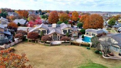 This remarkable estate is located on the 9th green of NWA's on Pinnacle Country Club in Arkansas - for sale on GolfHomes.com, golf home, golf lot