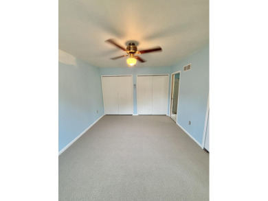 2 story, 2 bed, 1.5 bath townhouse condo with basement and on Plum Brook Golf Club in Michigan - for sale on GolfHomes.com, golf home, golf lot