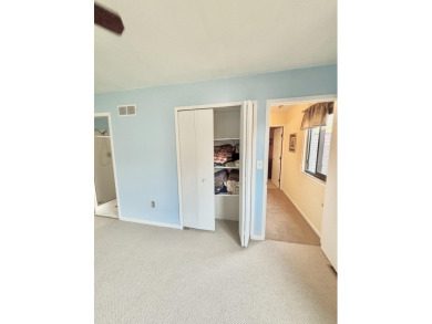 2 story, 2 bed, 1.5 bath townhouse condo with basement and on Plum Brook Golf Club in Michigan - for sale on GolfHomes.com, golf home, golf lot