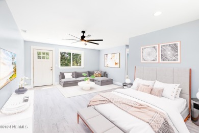 This spacious beach house offers extensive modern updates with on Oak Island Golf Club in North Carolina - for sale on GolfHomes.com, golf home, golf lot