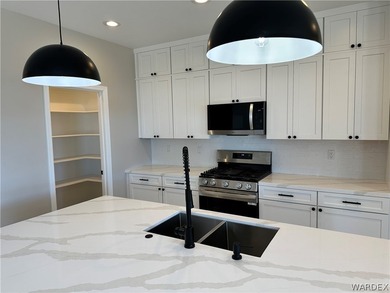 Welcome to your dream home in the prestigious Laughlin Ranch on Laughlin Ranch Golf Club in Arizona - for sale on GolfHomes.com, golf home, golf lot